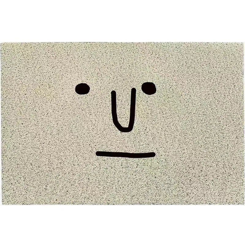Square PVC floor mat with a cartoon facial expression geometric pattern in Mr Big Nose colour.