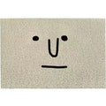 Square PVC floor mat with a cartoon facial expression geometric pattern in Mr Big Nose colour.