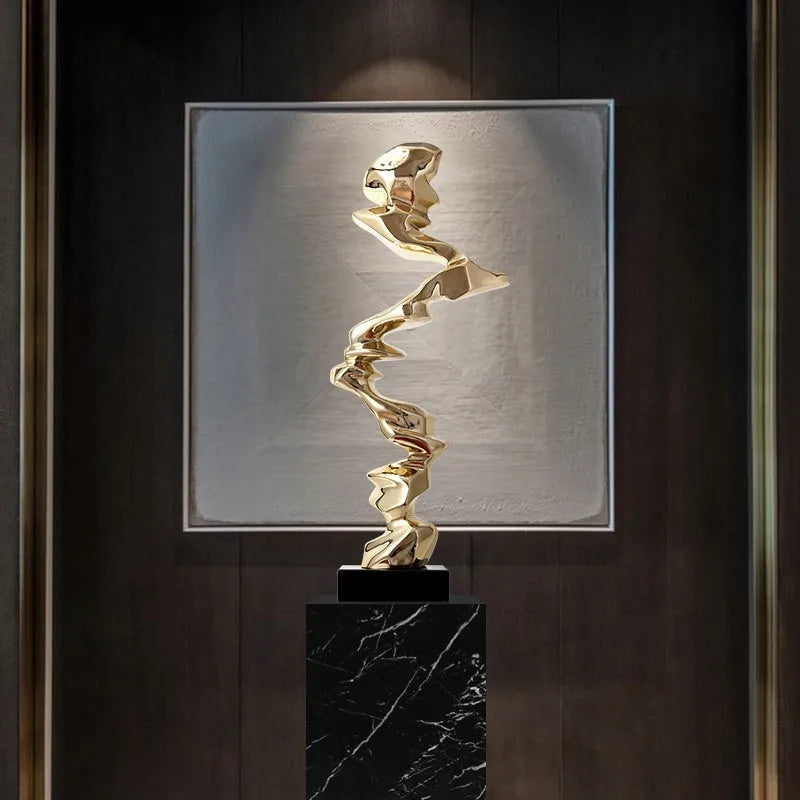 Abstract still life decorative sculpture in natural resin with metallic finish