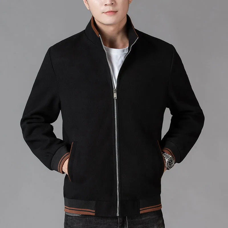 Men's grey polyester fleece sports jacket with long sleeves and a stick pocket.