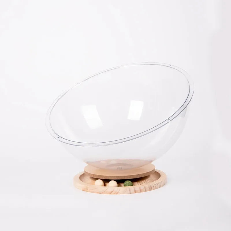 Transparent acrylic cat space capsule bed with turntable base on wooden floor