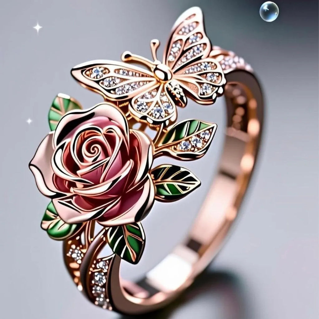 Colourful oil treatment fairy style ring with adjustable alloy construction showing flower, insect and leaf modelling