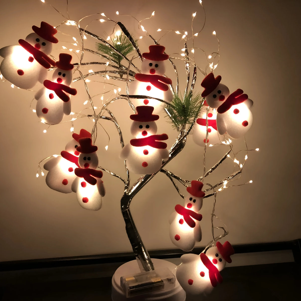 Snowman and elk deer LED Christmas string lights garland in warm white, with remote control.