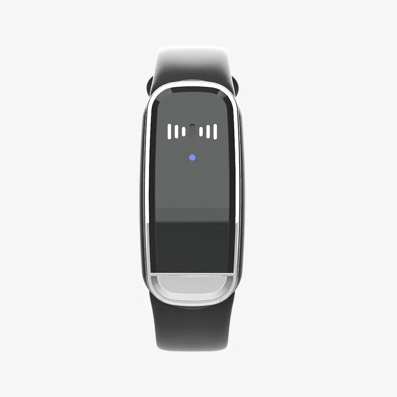 Black and white ultrasonic mosquito repellent bracelet on a wrist, showing compact design with USB charging port.