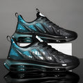 Men's black green and grey orange heightened platform casual running shoes with mesh upper and rubber sole.