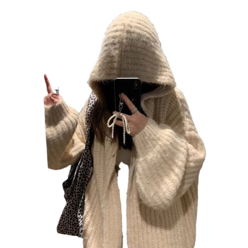 Women's dark grey loose-fit hooded acrylic sweater cardigan on a hanger