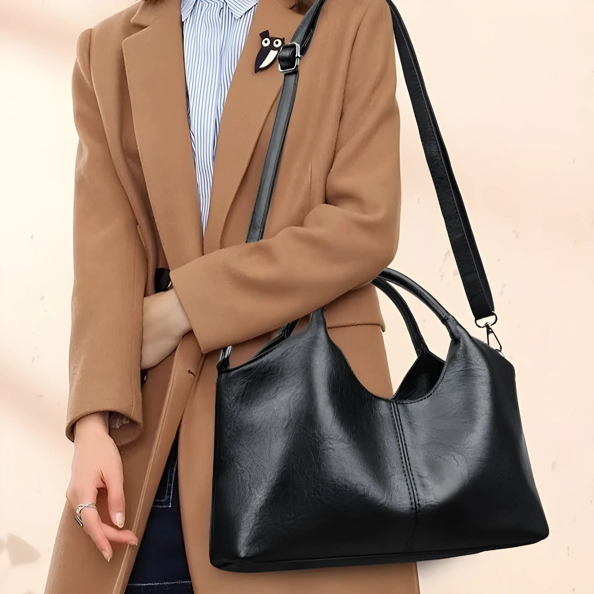 Women's soft genuine leather cross-body bag in beige colour, showing large capacity interior.