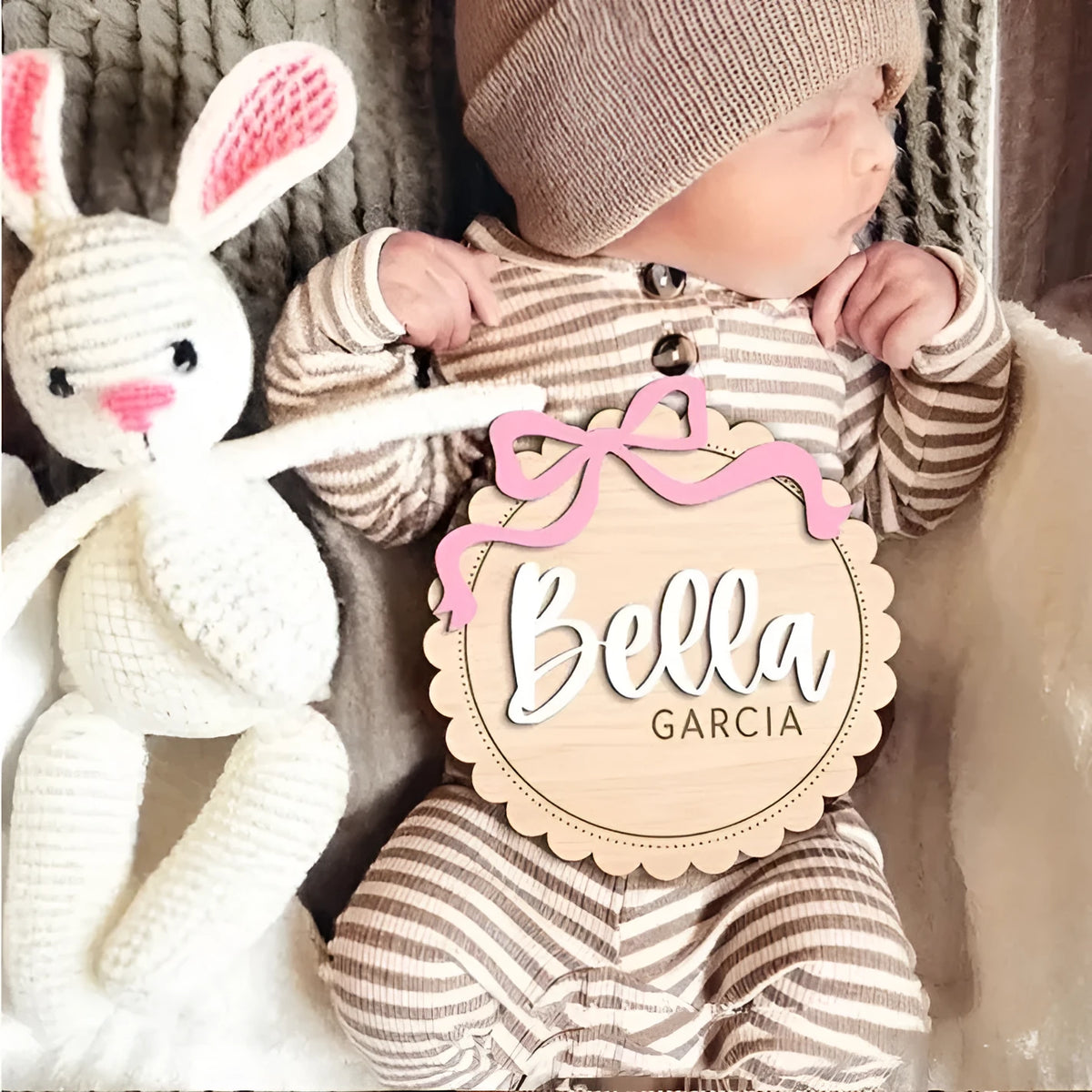 Square wooden baby ornament personalised with a custom name for nursery decor.