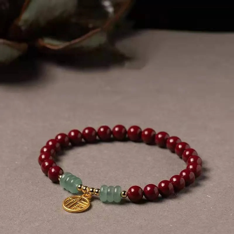 Handcrafted wave-shaped bracelet made from cinnabar and copper beads in national style