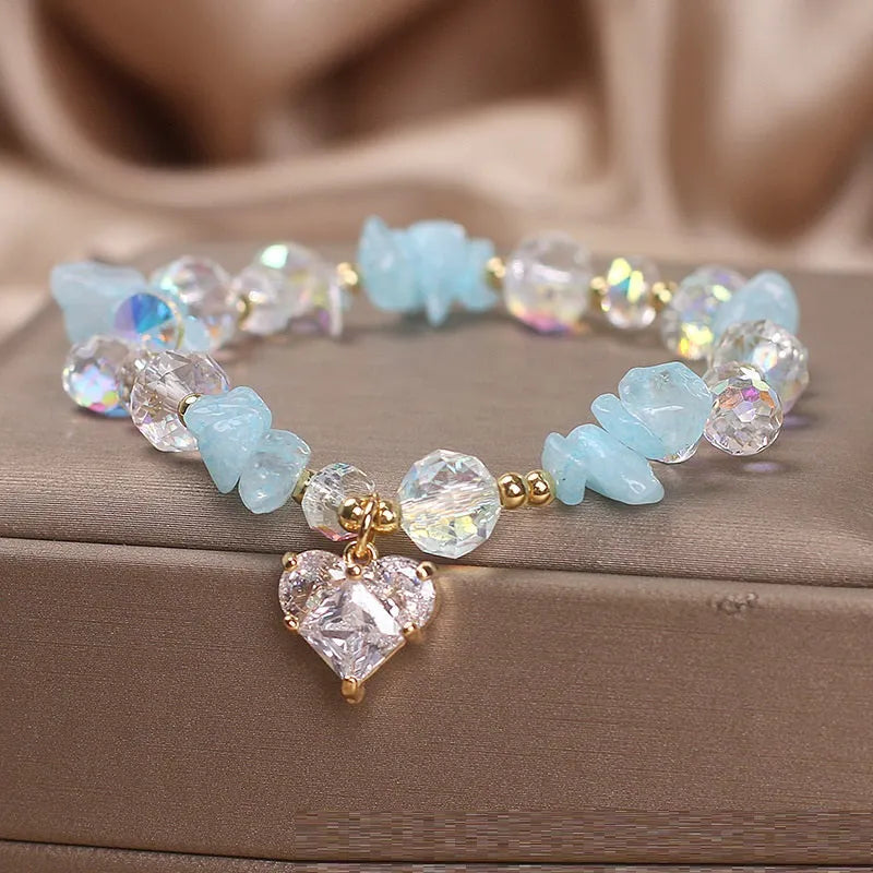 Sky blue aquamarine gravel crystal bracelet for women with heart detail and electroplated finish