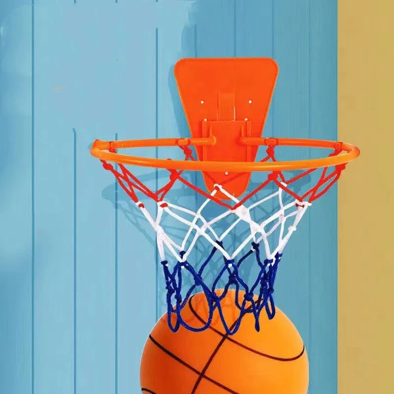 Silent PU foam training basketball in assorted colours showing smooth texture and basketball sizing