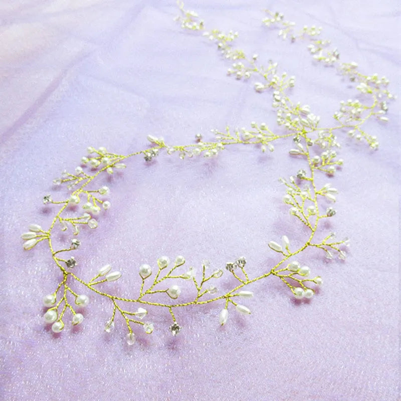 Gold bridal hair band with crystals and pearls on a copper wire base
