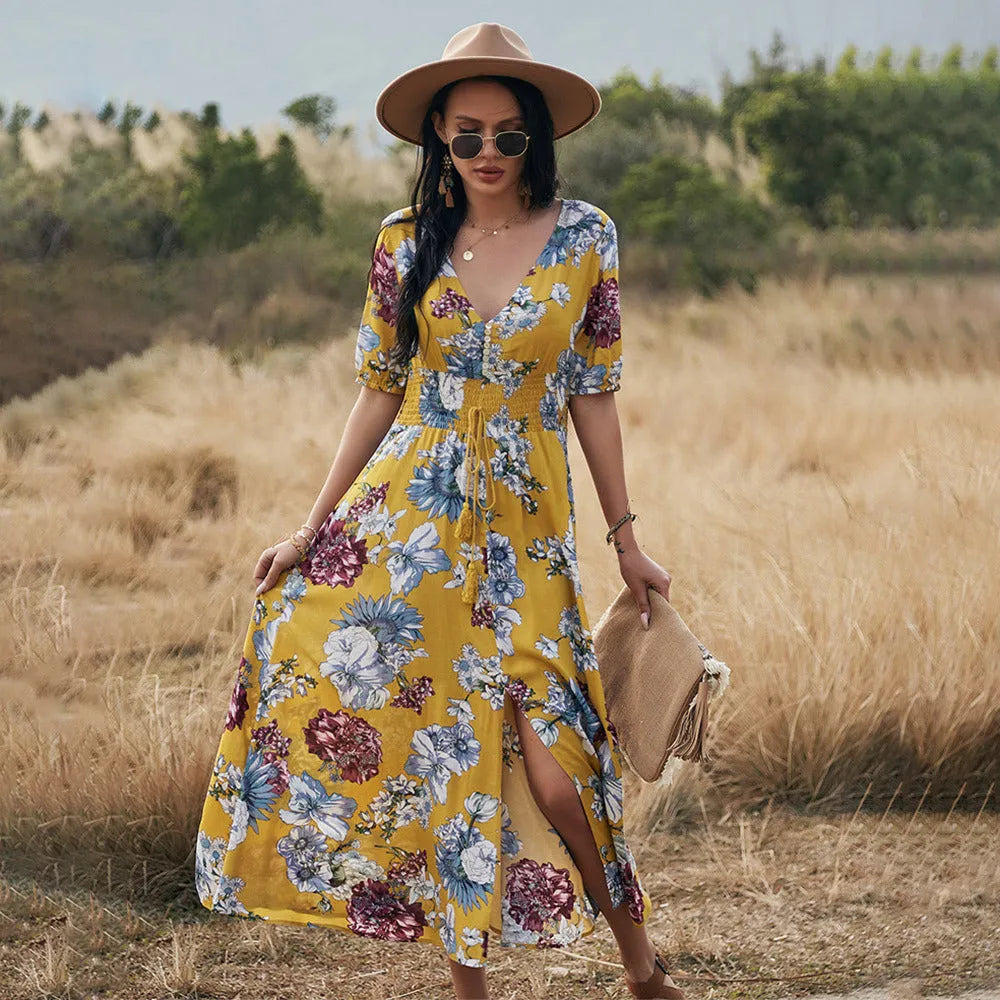 Women's floral print beach dress with v-neck and elastic waist in yellow colour