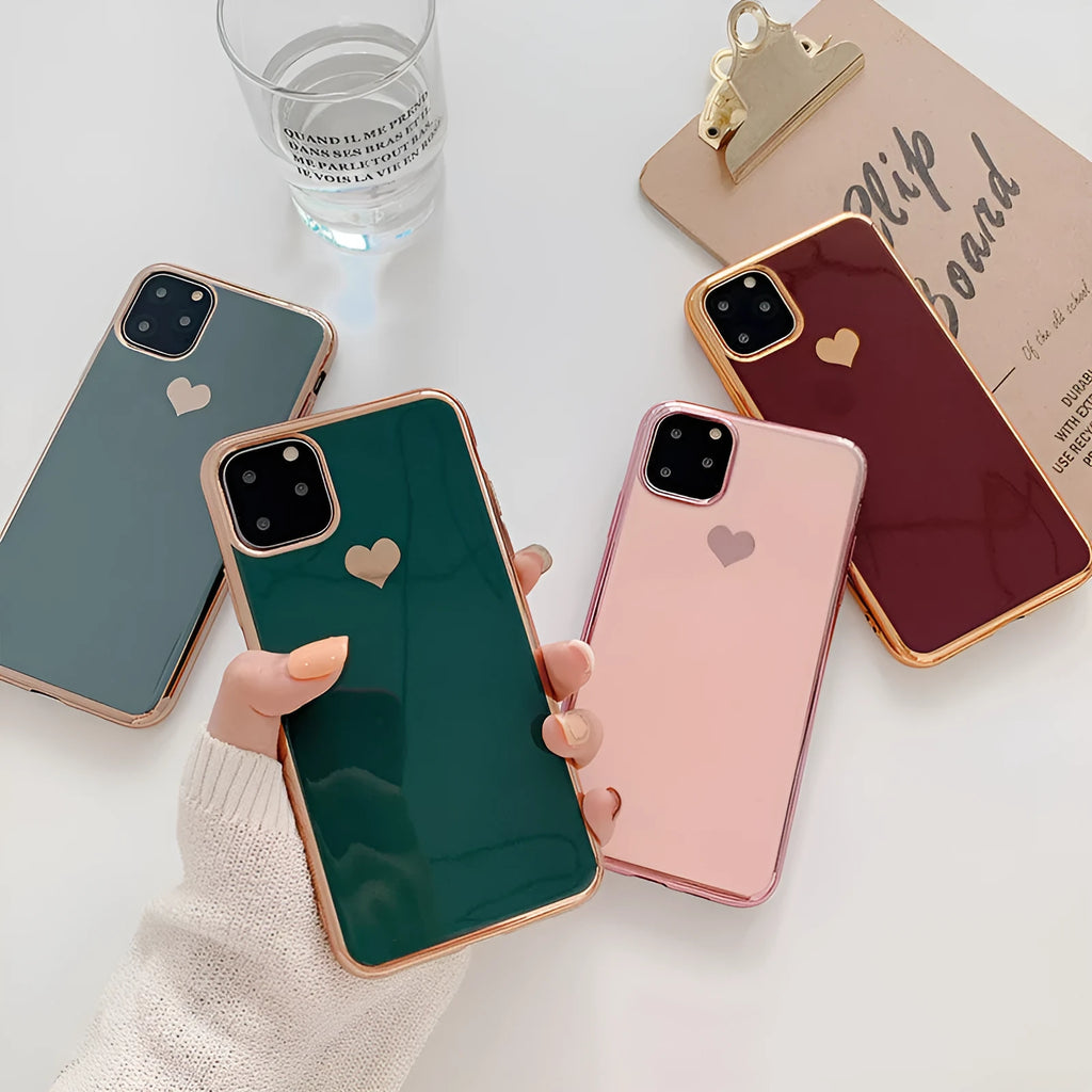 Solid colour TPU phone back cover for iPhone, shown in Blue, Claret, Pink, and Green.