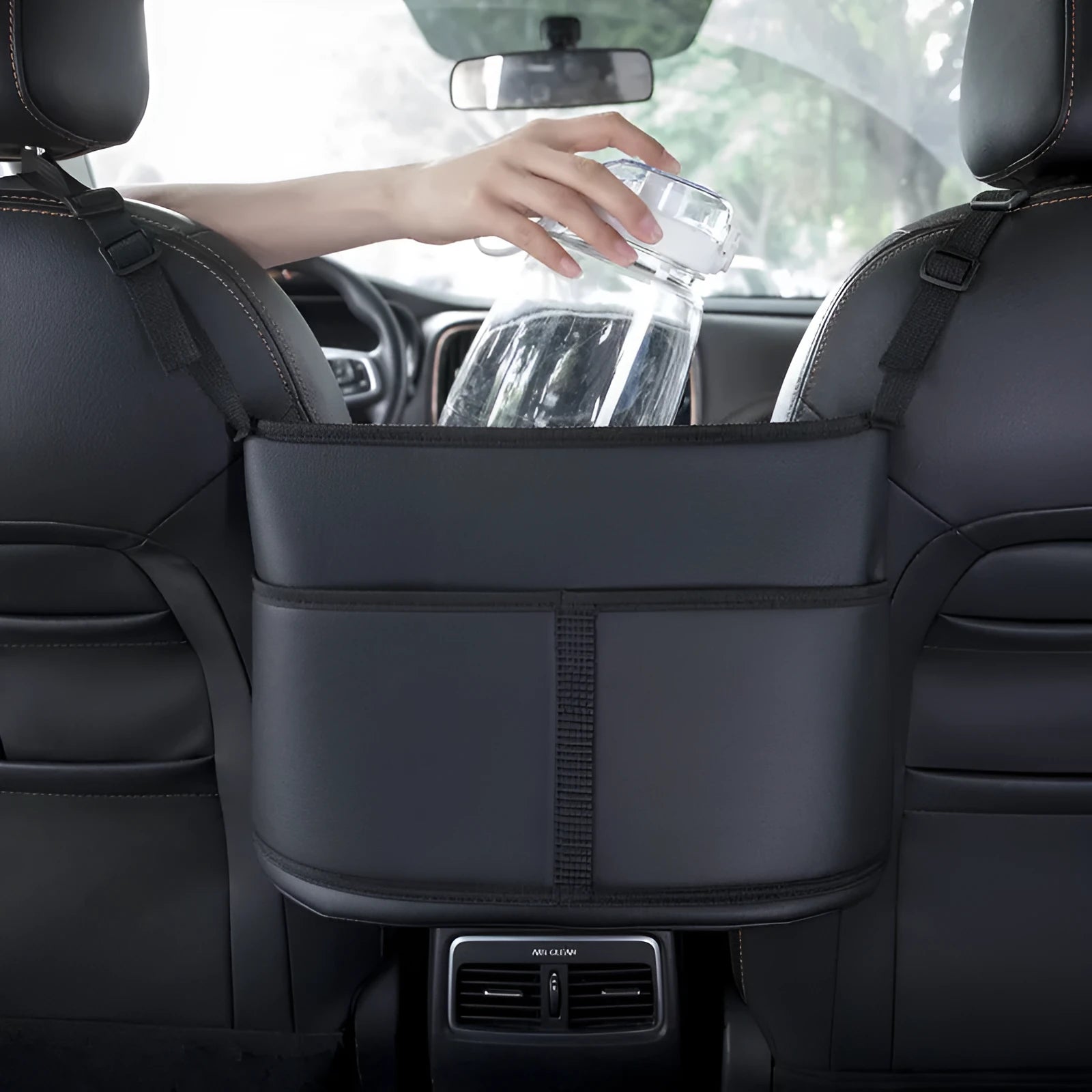 Black leather car seat storage bag with sports carbon fibre pattern measuring 38cm wide