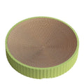 Green round cat scratching board measuring 55cm with white corrugated paper surface and two replacement refills