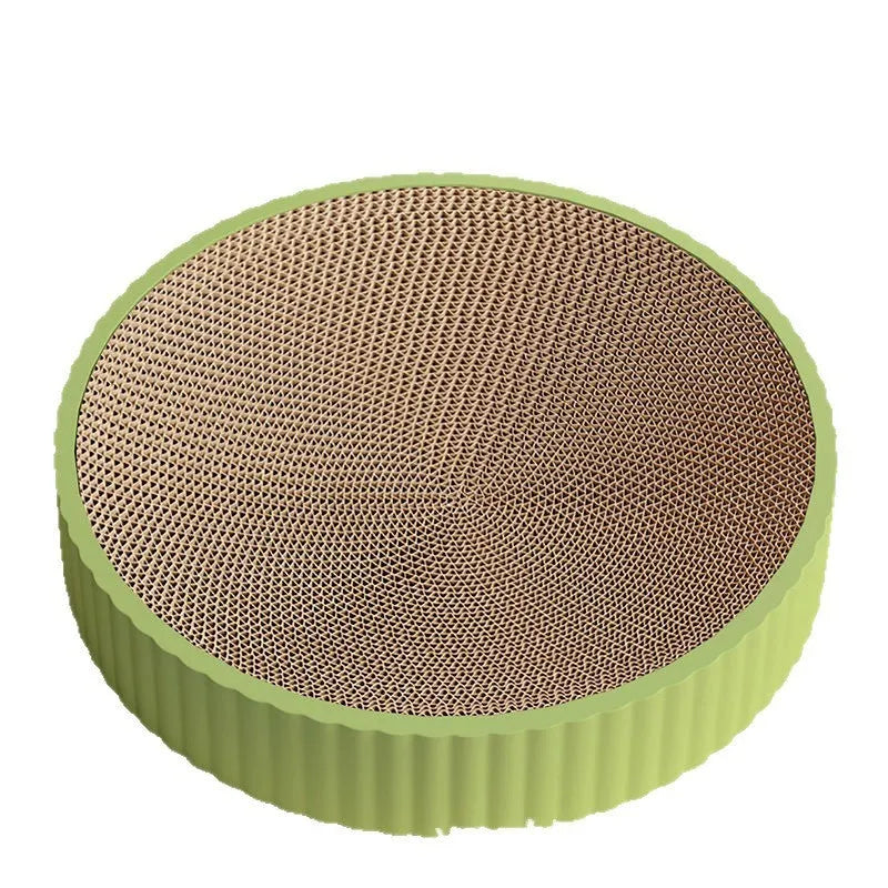 Green round cat scratching board measuring 55cm with white corrugated paper surface and two replacement refills