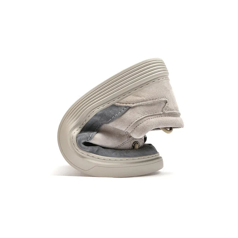 Men's grey casual leather skate shoes with round toe and lace-up front on a rubber sole.