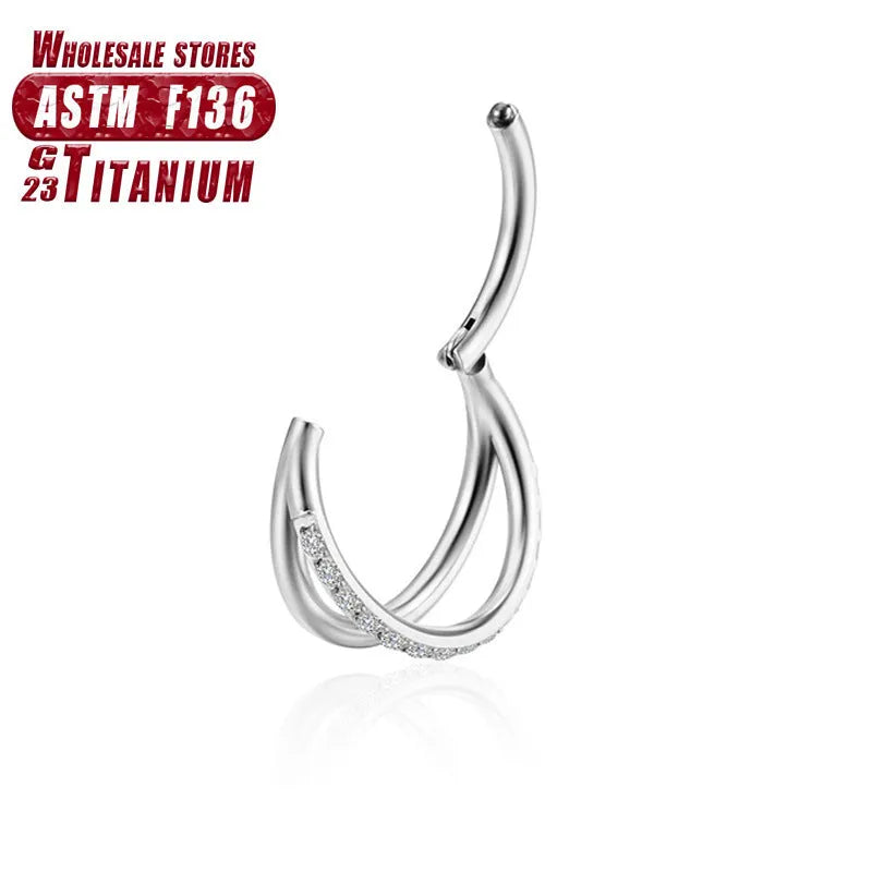 Titanium alloy fork prong nose ring on a white background, showing silver and gold colour options