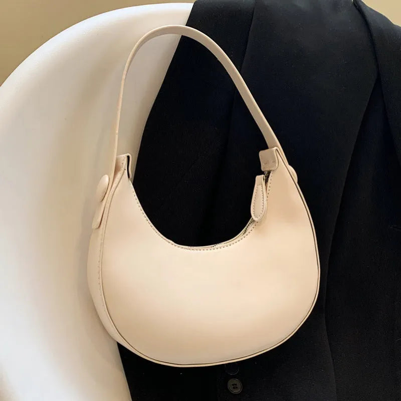 Women's PU dumpling shape shoulder bag in retro brown with zipper compartment, measuring 21x20x6cm