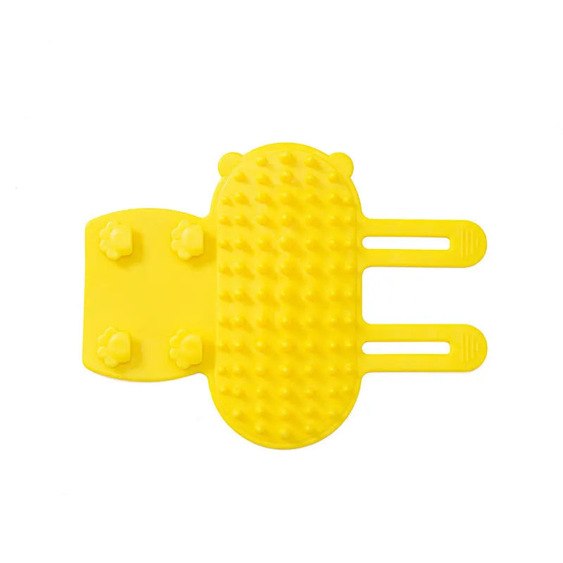 Silicone pet grooming comb with adjustable strap mounted on table leg for cats and dogs
