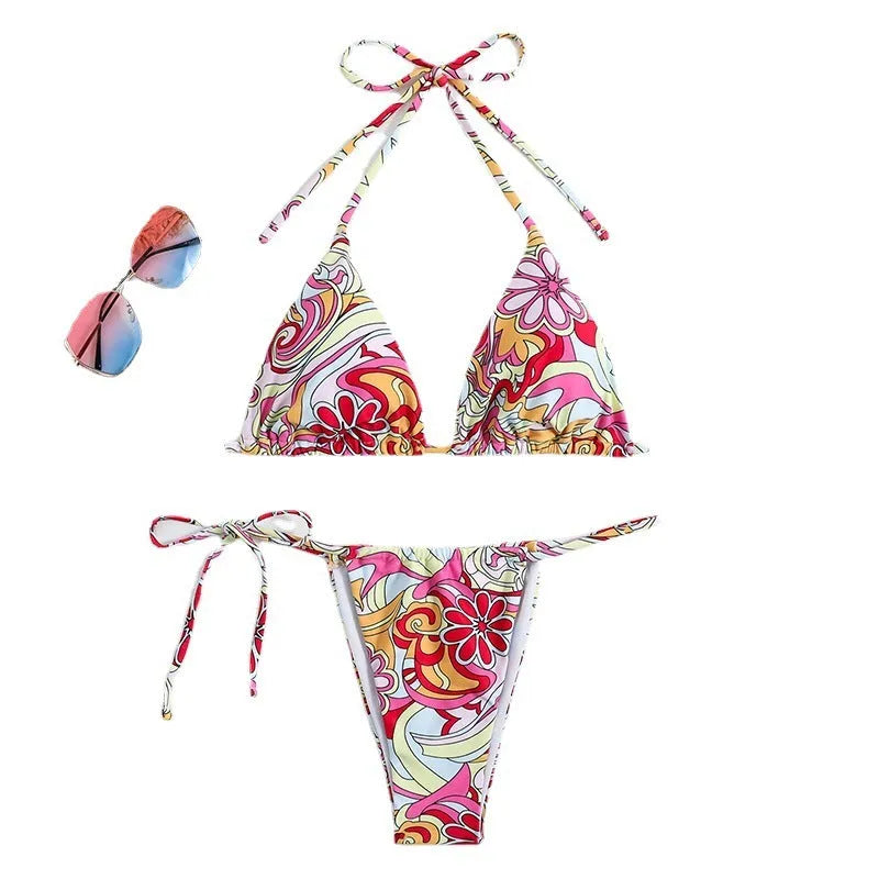 Women's triangle printed bikini set with halter neck top and separate bottom in multicolor pattern