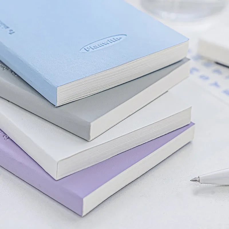 Embossed simple visual daily meter book notebook showing colour options: white, purple, blue, grey, and protective cover.