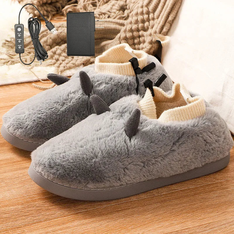 USB electric heating slippers in black, grey, green, and purple with a USB cable on a wooden floor.