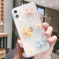 Soft rubber iPhone case with New Year's flowers decorative pattern showing front and back views