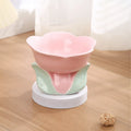 Blue ceramic elevated pet bowl with floral pattern and non-slip base for cats and small dogs.
