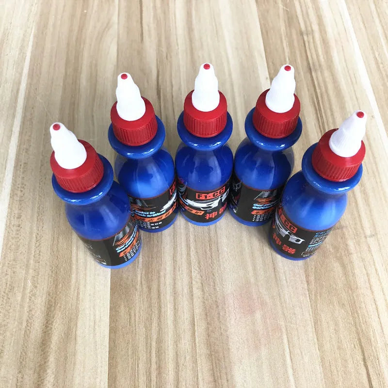 Automotive scratch repair agent bottle with dedicated wiping tool for car surface imperfections