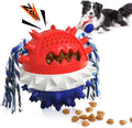 Blue and red TPR rubber dog ball with treat hole and squeaker for large breed chewers.