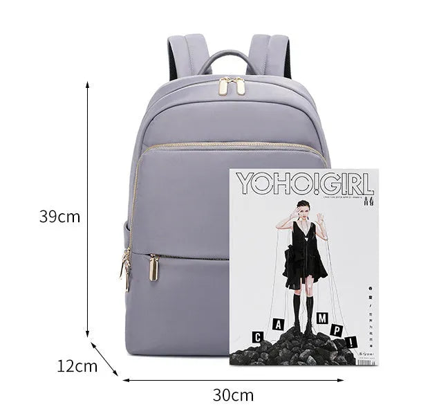 Oxford cloth women's backpack in black or purplish grey with large capacity and anti-theft zipper