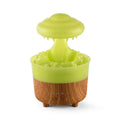 Rain cloud shaped humidifier with wood grain finish emitting mist and glowing with LED light