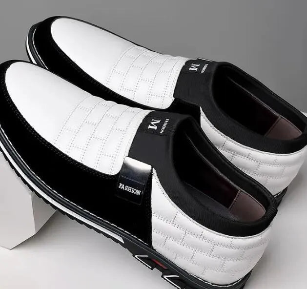 Men's large size black leather casual low-top shoes on a white background.
