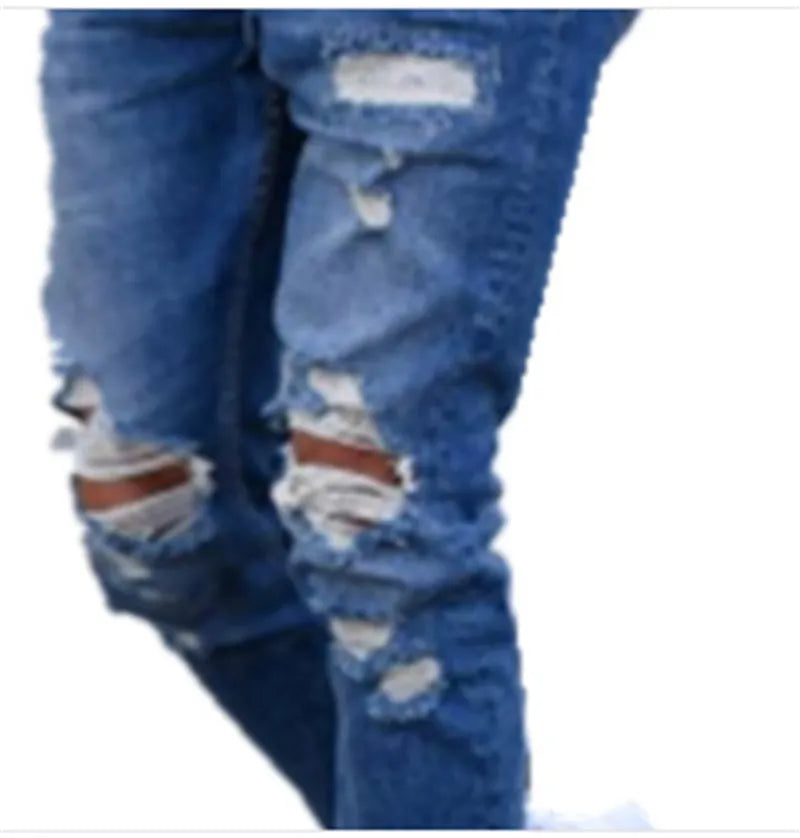 Men's deep blue cotton jeans laid flat, showing button fly and five-pocket design