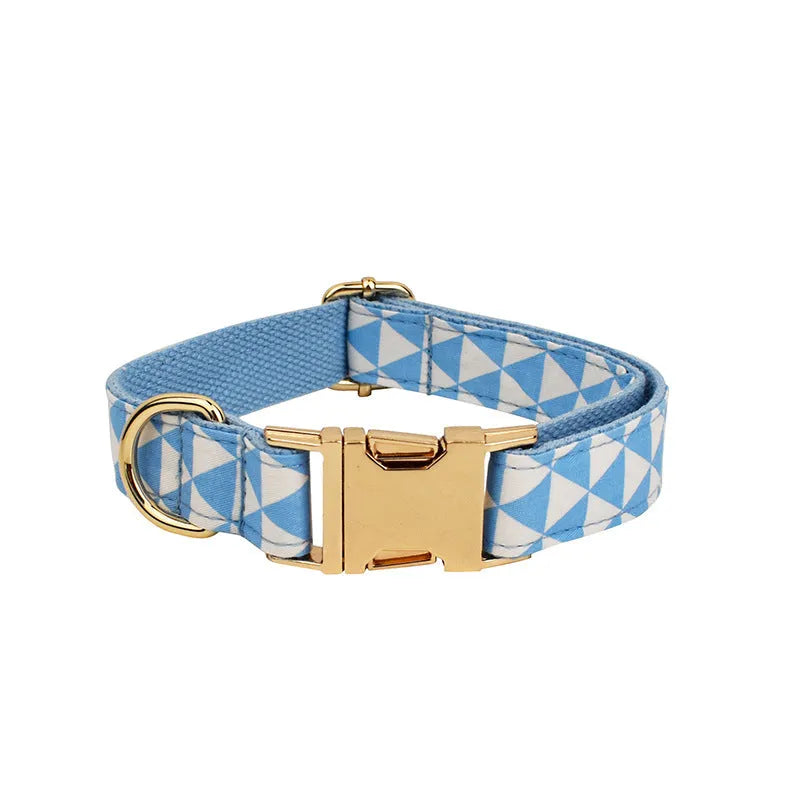 Blue triangular ring rope dog vest, collar, leash, and bow four-piece set laid out flat.
