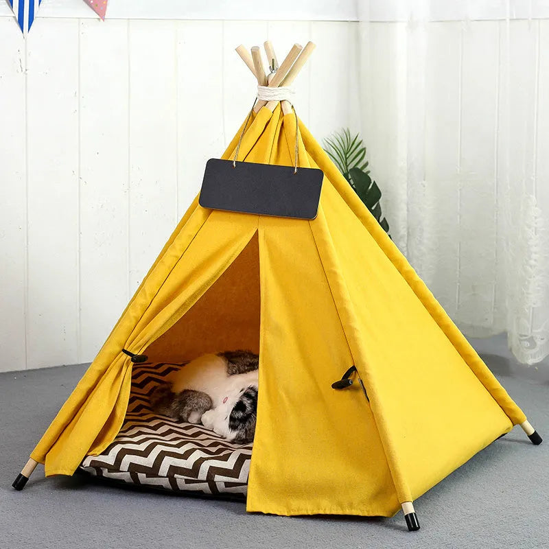 White striped pet teepee tent bed with cushion for a small dog indoors