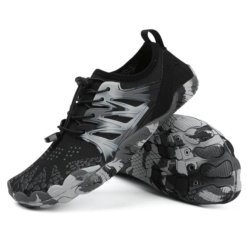 Quick-drying lace-up wading shoes in multiple colours with mesh upper and textured rubber sole.