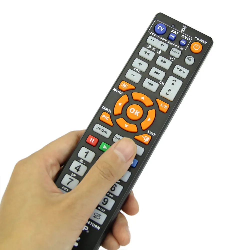 Black L336 learning remote control showing full key layout with programming capability for audio equipment