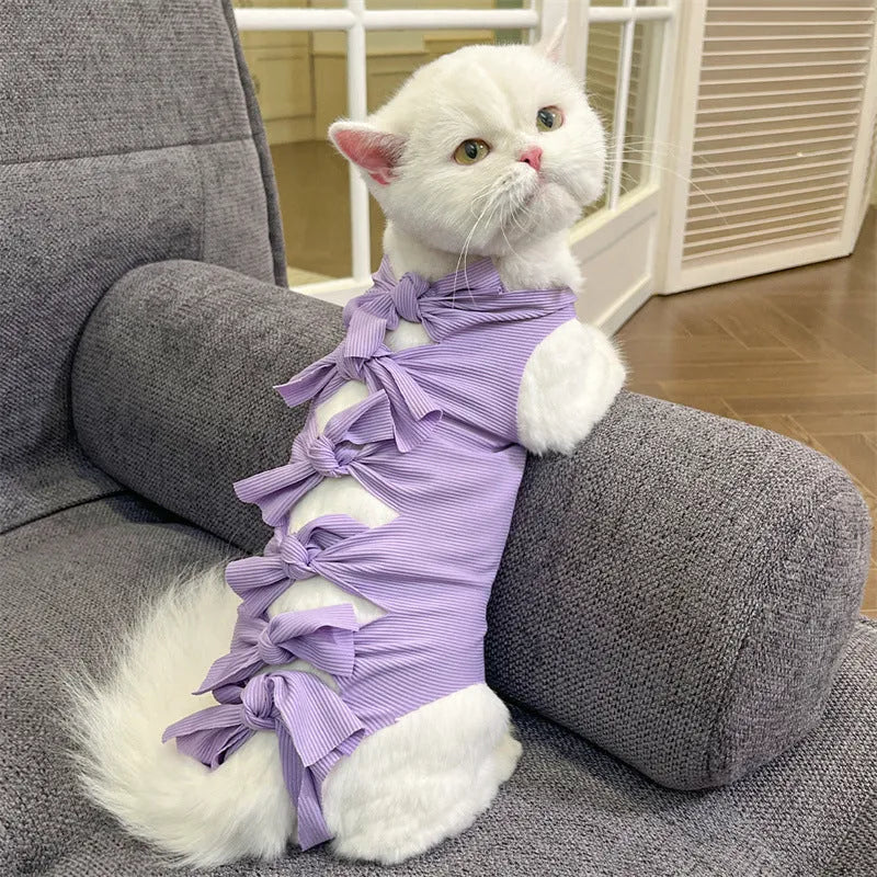Lace-up polyester cat recovery suit for post-surgery care in blue, shown on a cat mannequin.