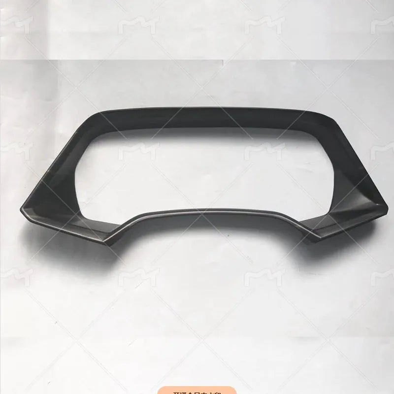 BMW X5 dashboard decorative frame in Peach Wood and Carbon Fiber finishes with double-sided adhesive tape