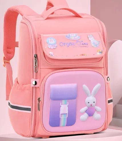 Children's cartoon backpack in Rabbit or Spaceman print with airpillow straps, shown in pink, purple, blue green, or blue red.