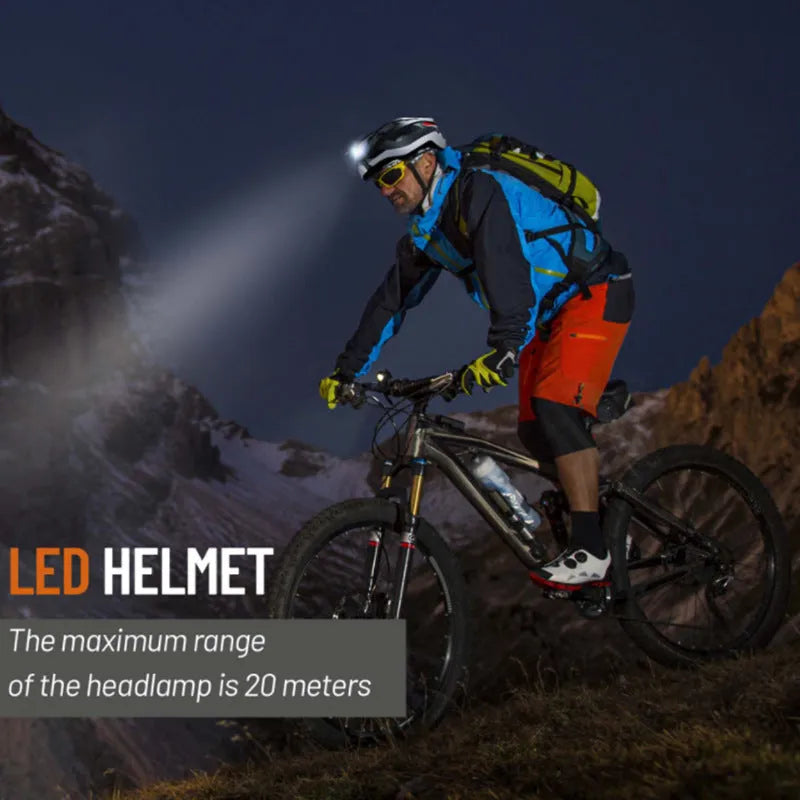 Black and grey smart cycling helmet with integrated warning lights showing USB charging port