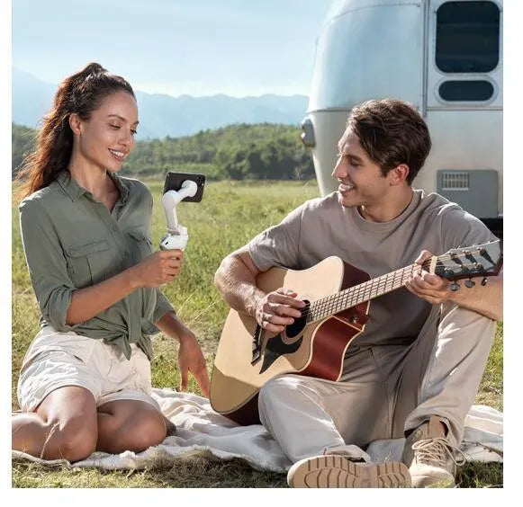 Mobile power bank with PTZ camera mount showing 2450mAh battery capacity