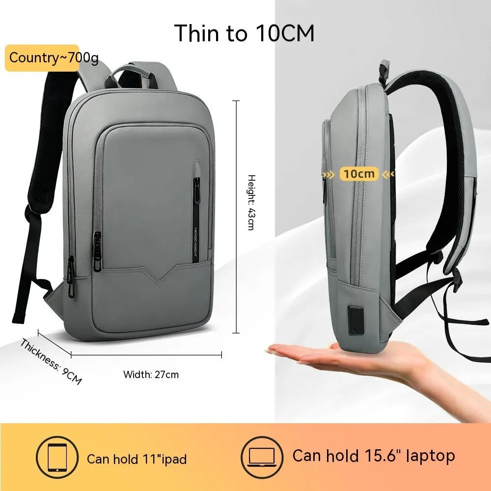 Men's business backpack in Oxford cloth with USB interface, solid colour, gray or blue, under 20L