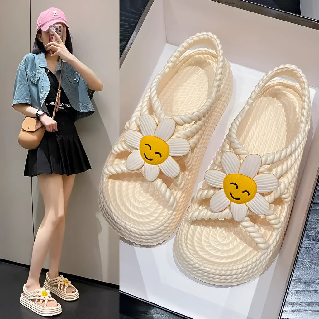 PVC round-toe sandals with non-slip soles and floral decoration in beige and black colour options
