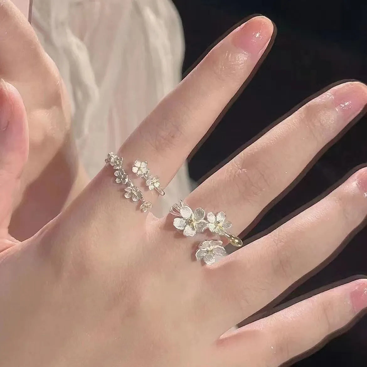 Three-dimensional flower ring with camellia elements and open mouth design in zinc alloy