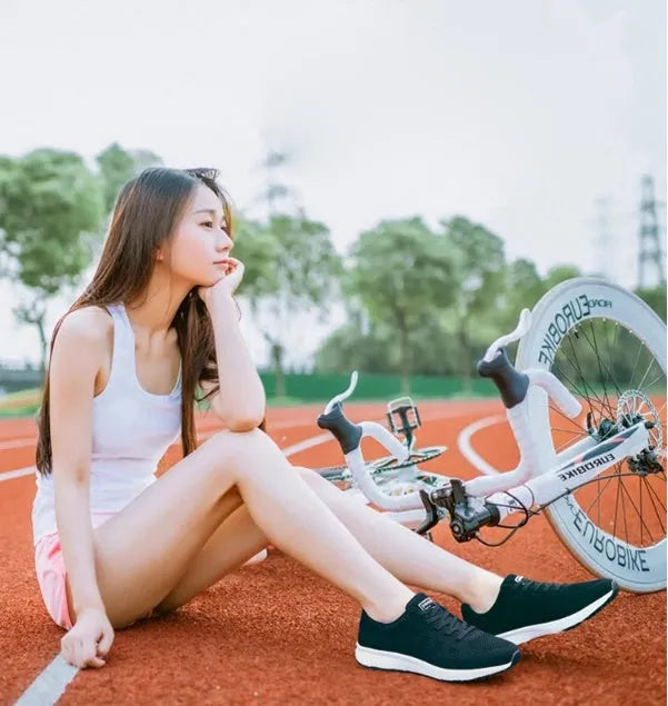 Women's breathable mesh sports shoes in black, pink or rose red with flat heel and MD sole, sizes EU 35-39