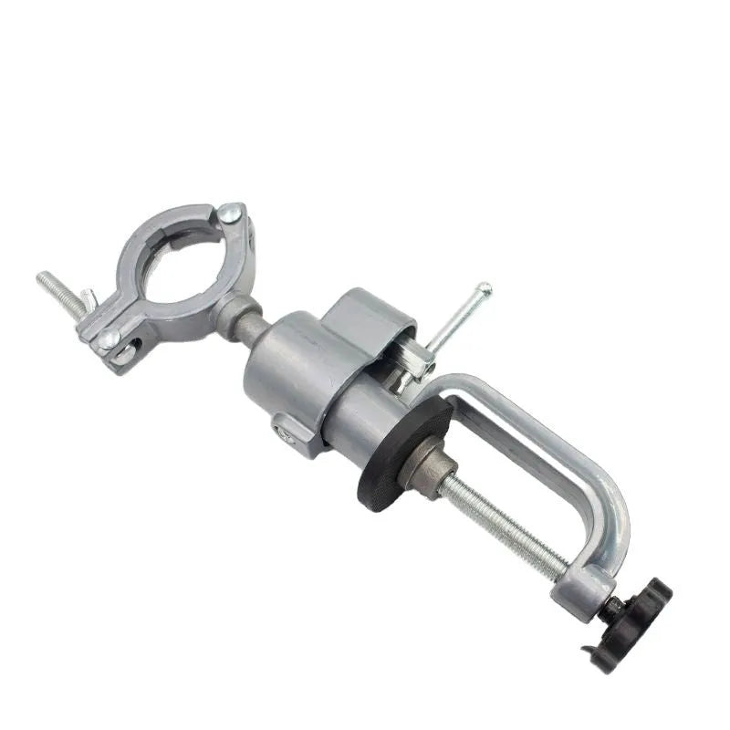 Bench vise with rotating bracket clamped to workbench edge